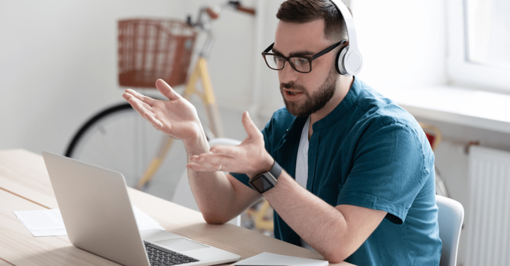 Man working from home on conference call